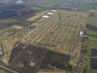 Oblique aerial view centred on the explosives stores, taken from the SW