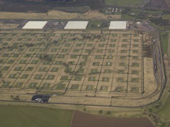 Oblique aerial view centred on the explosives stores, taken from the SSE.