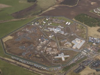 Oblique aerial view centred on the State Hospital, taken from the ESE.