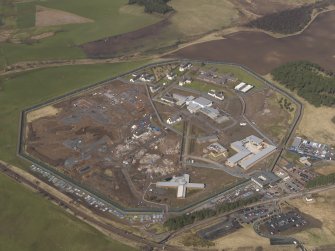 Oblique aerial view centred on the State Hospital, taken from the E.