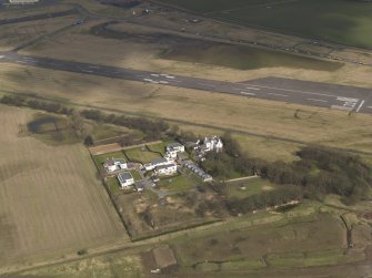 Oblique aerial view centred on the castle, taken from the SSW.