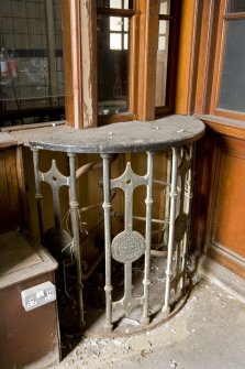 Interior. Detail of the turnstile within the main entrance hall of the bath house.