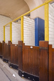 Interior. Detail of the changing cubicles on the balcony of the pool hall.