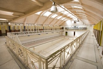 Interior. Diagonal view looking across the upper level of the pool hall, taken from east.