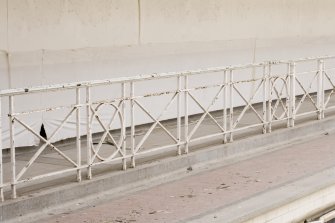 Interior. Detail of railing at poolside level.