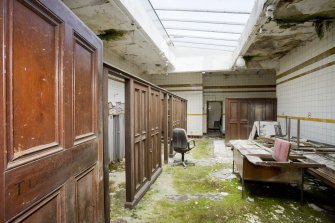 Interior. View looking along the remaining cubicles within the turkish bath.