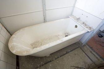 Interior. Detail of a surviving slipper bath within a cubicle in the female bath salon.