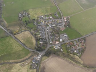 Oblique aerial view centred on the village, taken from the E.