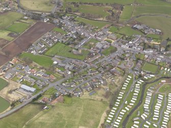 General oblique aerial view centred on the village, taken from the NNW.