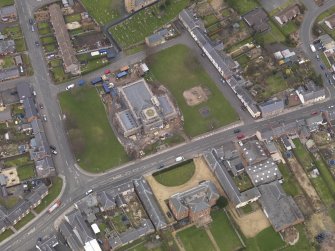 Oblique aerial view centred on the town hall, taken from the SW.