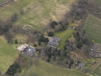 Oblique aerial view centred on the country house, taken from the NNW.