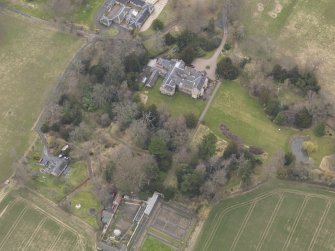 Oblique aerial view centred on the country house, taken from the S.