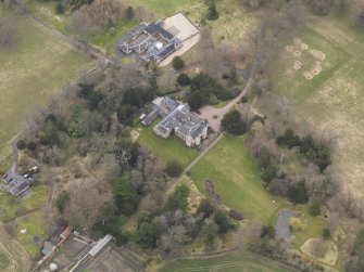 Oblique aerial view centred on the country house, taken from the S.