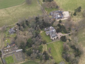 Oblique aerial view centred on the country house, taken from the SE.