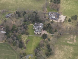 Oblique aerial view centred on the country house, taken from the ENE.