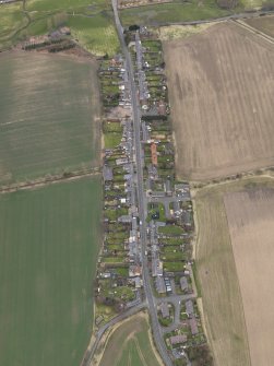 Oblique aerial view centred on the village, taken from the ENE.
