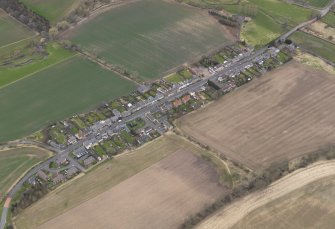 Oblique aerial view centred on the village, taken from the NNE.