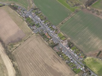 Oblique aerial view centred on the village, taken from the NW.