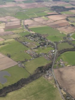 General oblique aerial view centred on the village, taken from the ESE.