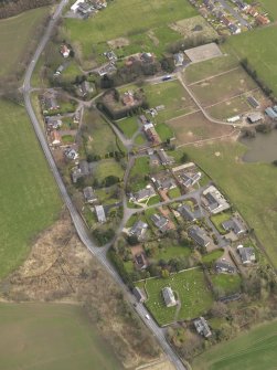 Oblique aerial view centred on the village, taken from the WNW.