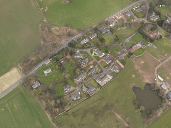 Oblique aerial view centred on the village, taken from the SW.