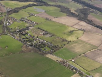 General oblique aerial view centred on the village, taken from the NW.