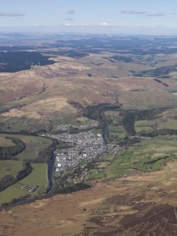 Oblique aerial view (distant) centred on the town, taken from the SE.