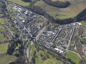 Oblique aerial view centred on the planned village with the town adjacent, taken from the NNW.