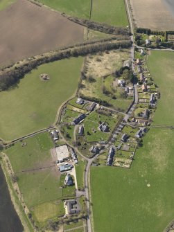 Oblique aerial view centred on the village, taken from the NE.