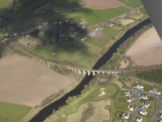 Oblique aerial view centred on the railway viaduct, taken from the SE.