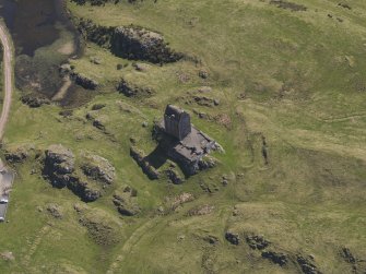 Oblique aerial view centred on the tower-house, taken from the WNW.