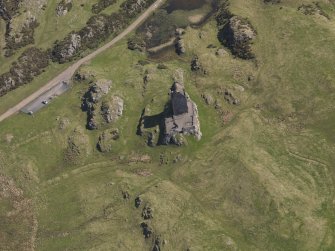 Oblique aerial view centred on the tower-house, taken from the WSW.