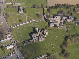 Oblique aerial view centred on the abbey, taken from the SW.