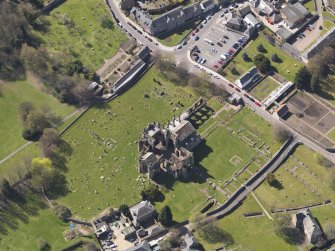 Oblique aerial view centred on the abbey, taken from the NE.