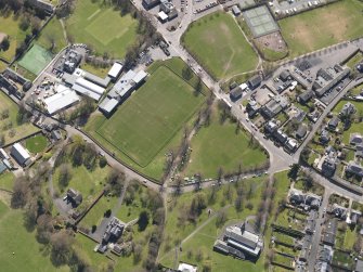 Oblique aerial view centred on the rugby ground, taken from the NW.