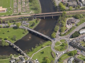 Oblique aerial view of the three bridges, taken from the NW.