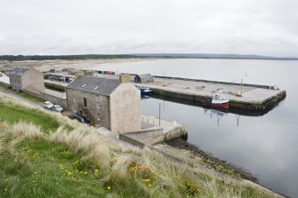 View from NW showing North Quay, Telford House, warehouse and South Pier.