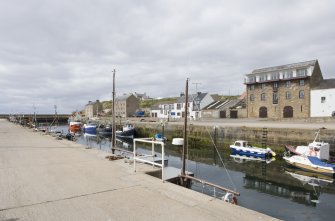 View from SE from S pier looking to North Pier and the warehouses.