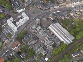 Oblique aerial view centred on the High Street, taken from the SW.