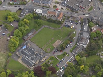 Oblique aerial view centred on the school, taken from the NW.