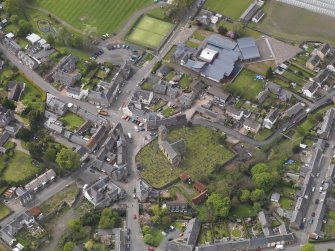 Oblique aerial view centred on the parish church, taken from the SE.