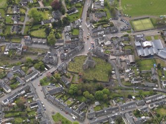 Oblique aerial view centred on the parish church, taken from the N.