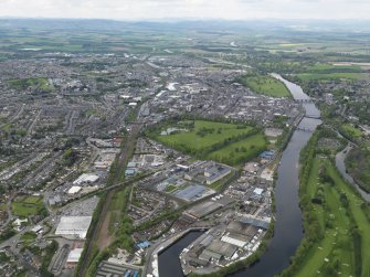 General oblique aerial view centred on the town, taken from the SSE.