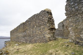 E outer wall and entrance, view from NE