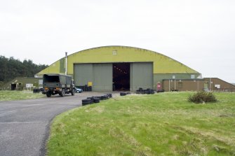 View from NE of the gable end of the L type aircraft hangar (sports hall) in the SE dispersal area.