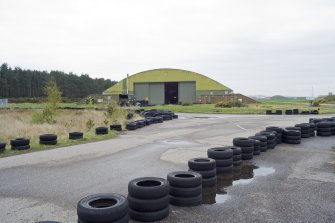 General view of gable end of the L type aircraft hangar (sports hall) with approach taxiways  in the SE dispersal area.