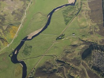 Oblique aerial view of the remains of the township, rig and broch at Kilearnan, taken from the NW.