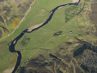 Oblique aerial view of the remains of the township, rig and broch at Kilearnan, taken from the WNW.