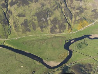 Oblique aerial view of the remains of the township buildings and rig, taken from the SW.