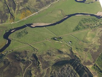 Oblique aerial view of the remains of the township, rig and broch at Kilearnan, taken from the SW.